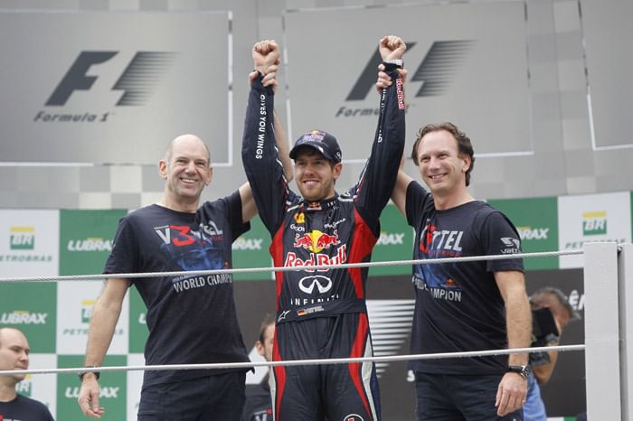 Vettel champion as Button wins thriller