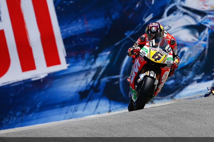 MotoGP: Bradl takes shock Laguna pole