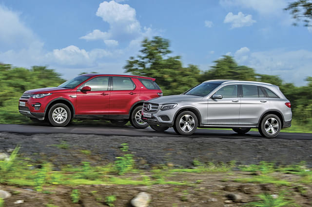 Mercedes GLC300 vs Land Rover Discovery Sport petrol comp...