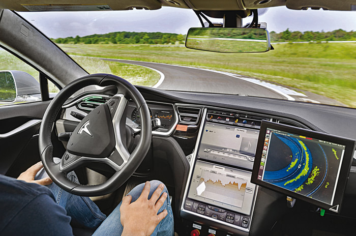 Driving the autonomous Tesla Model S by Bosch 