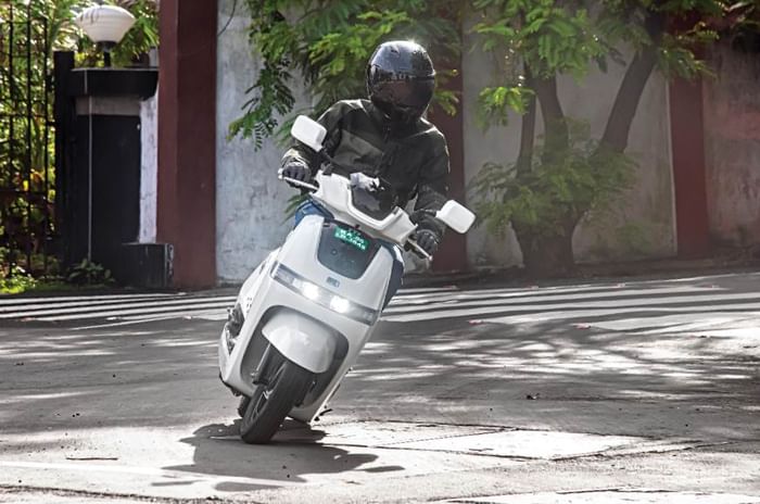 How far can you go on a fully charged TVS iQube?