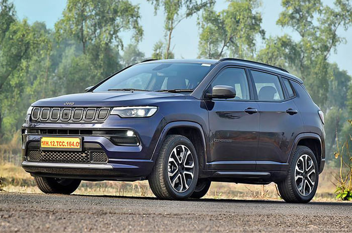 I find the Hyundai Tucson quite expensive, should I buy the Mahindra XUV700 instead? Jeep Compass front quarter