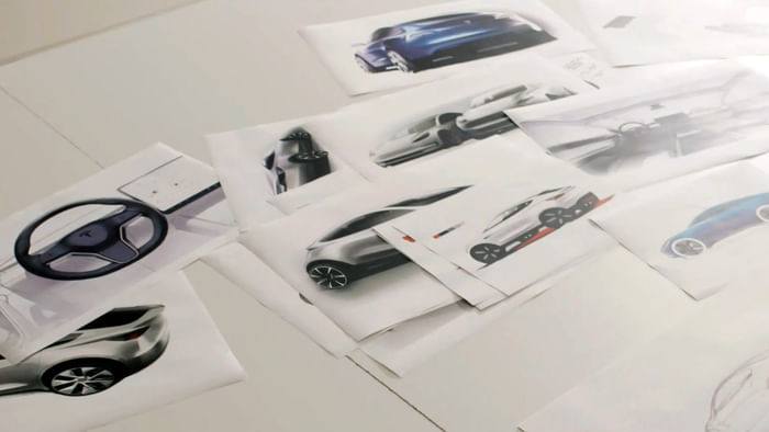 Tesla teases entry level hatchback ahead of debut