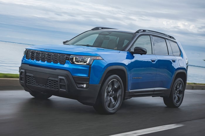Jeep Cherokee front left side on road Jeep Cherokee front left side on road