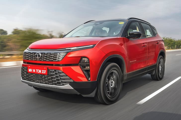 Tata harrier petrol front left side on road driving 