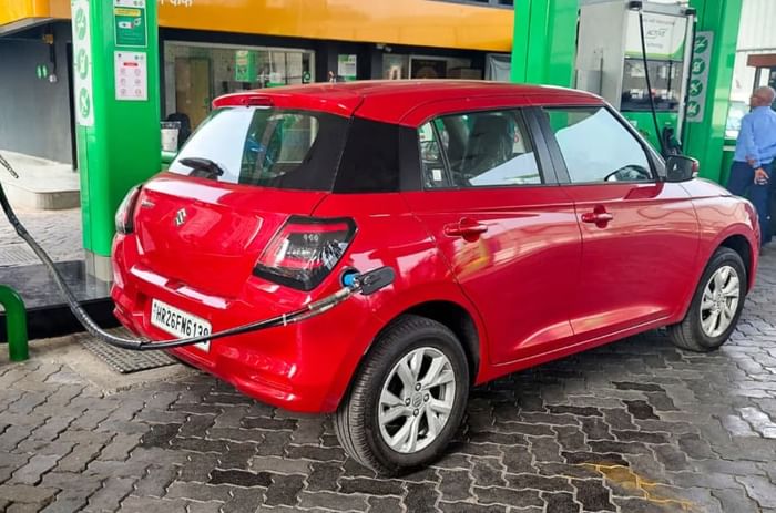 Maruti Swift CNG filling at fuel pump