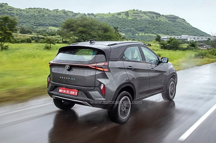 2025 Tata Nexon EV rear on road tracking shot action 2025 Tata Nexon EV rear on road tracking shot action
