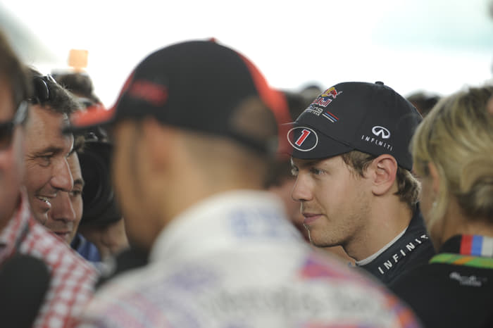 Vettel patiently takes questions from the press.