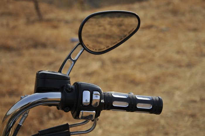 Delicate mirror stalks and chrome finished switches. 