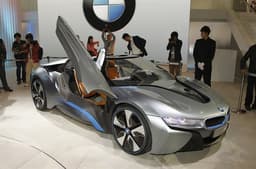 The BMW i8 Spyder previews an open-top version of BMW's new hybrid sports car for 2015