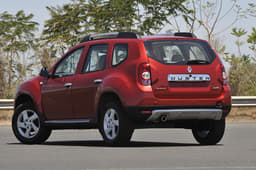 The Duster's flared-out wheel arches, huge ground clearance and scuff plates are pure SUV elements.