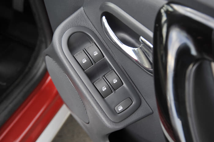 Unlike the Logan, the Duster's power window switches are located on the doors.