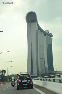 The convoy makes its way through the streets of Singapore to the Malaysian border. 