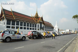 The convoy in front of Bangkok's Royal Palace. 