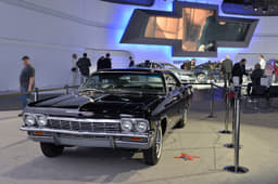 Early Chevrolet Impala is on show with the latest model

