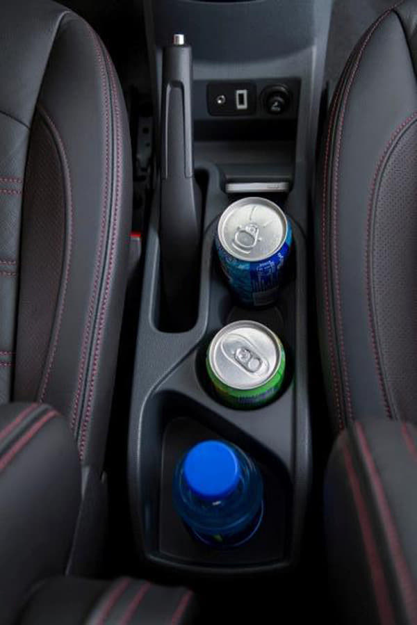 There are a fair number of storage spaces and cupholders in the spacious cabin