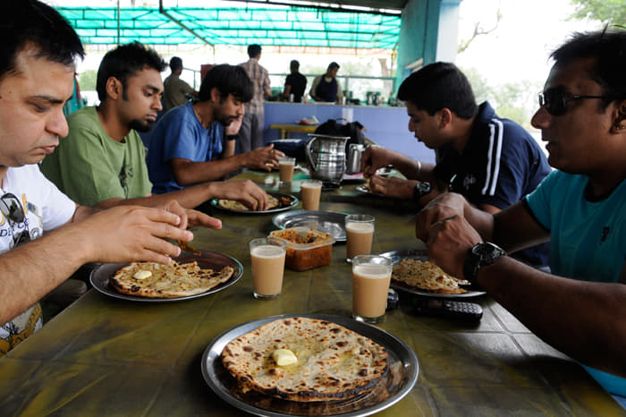 Parathas with enough butter to give an elephant cholesterol.