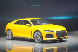 The Audi Sport Quattro coupe concept features a bi-turbo V8 and electric motor with plug-in capability.