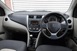 Maruti Suzuki Celerio Dashboard looks upmarket, steering wheel shared with higher Maruti models like the swift. 