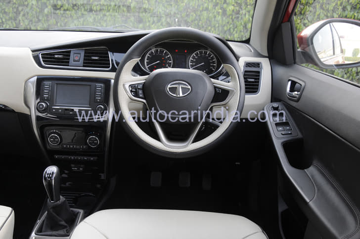 The smart-looking dashboard uses a beige-themed dual-tone colour scheme.
