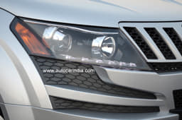 The intricate headlight clusters remain, with LED daytime running lights and projector lamps. The fog lamps are missing though.