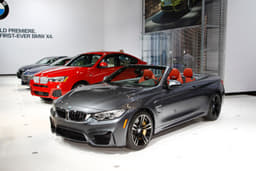 The new 425bhp BMW M4 convertible is also on display. 