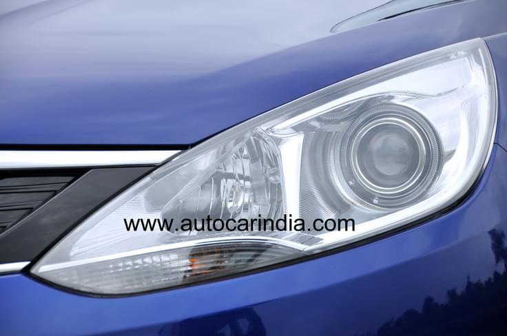 Stretched headlamps look sporty and aggressive. The Zest also gets projector lights. Stretched headlamps look sporty and aggressive. The Zest also gets projector lights.