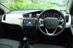 The dashboard gets a dual-tone theme. The steering wheel is a bit smaller than before.