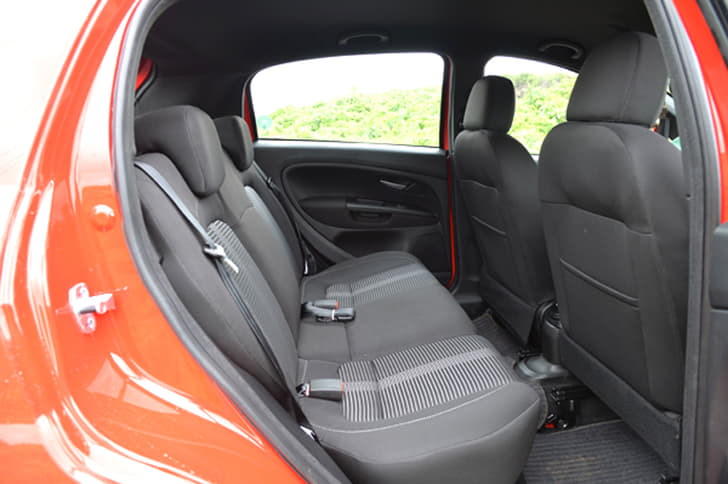 Unfortunately, rear seat space is still not as generous as rivals but you now get a rear AC vent with an integrated bottle holder.