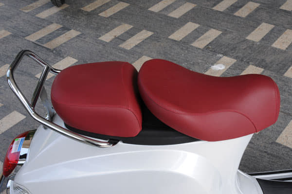 Dark red seat on white Elegante.