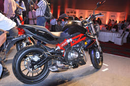 The silencer sits smartly tucked away under the motorcycle engine.