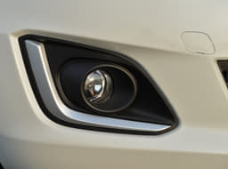 The front bumper gets brushed-aluminum fog-lamp surrounds. 