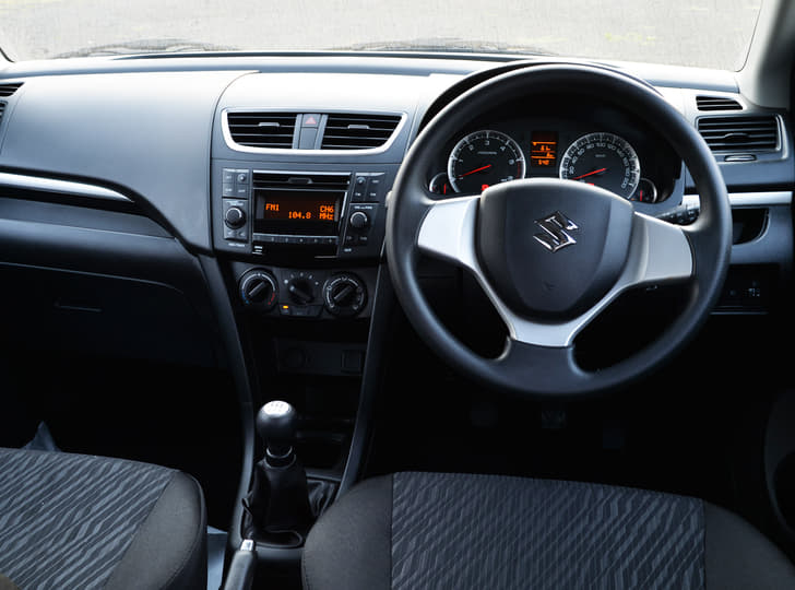 The Maruti Swift facelift mid-variants get a different stereo and dont come with feature such as automatic climate control, Bluetooth or steering mounted audio controls to name a few.