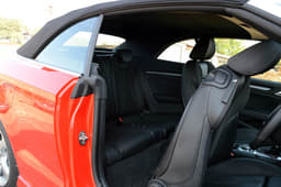 Not a lot of space in the back seats, especially if the driver and front passenger are tall.