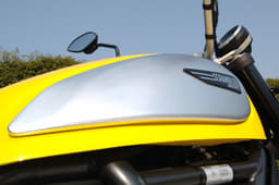 Scrambler has 13.7 litre fuel tank with interchangeable side panels.  