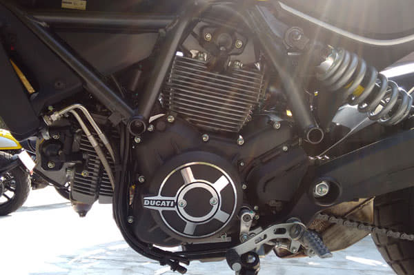 Seen here is Ducati's 803cc, four-stroke, fuel-injected, air and oil-cooled engine, producing 74bhp at 8,250rpm.