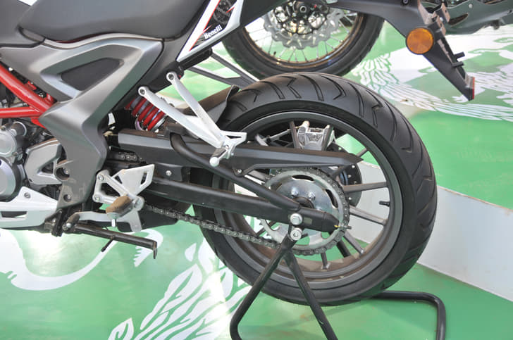 Monoshock does suspension duty at rear, mounted on a box-section swingarm and  chain final drive.   