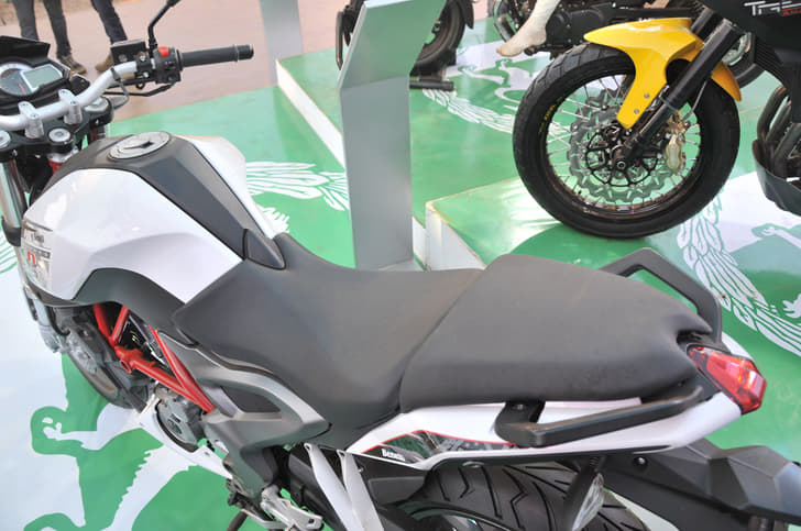 The TNT 25 gets split seats.