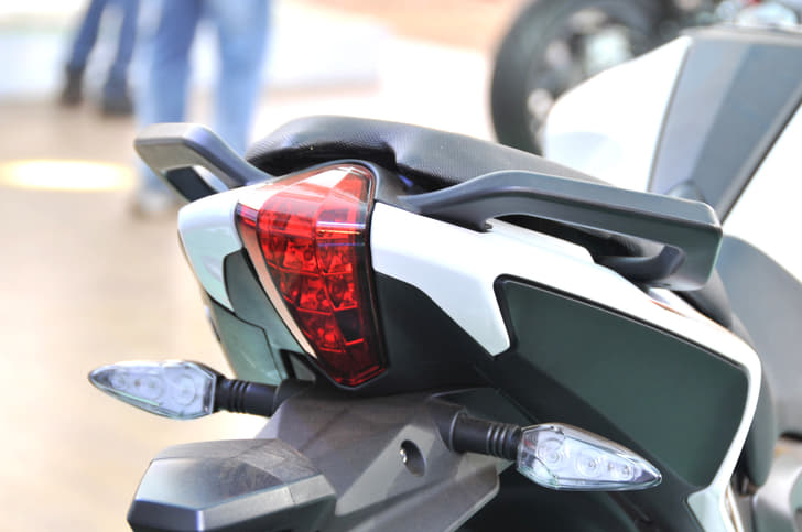 Tail light design is different from the TNT 300, grab handles are finished in black. 