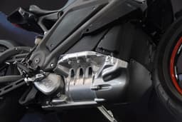 Longitudinally mounted, AC induction electric motor is oil-cooled, lithium-ion powered.