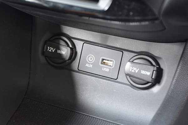 There are two 12V charging sockets on the centre console with aux and USB ports in between.