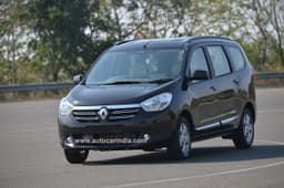 The roofline is virtually horizontal, the window line is subtly rising, and the bonnet is long enough to make it a two-box shape.