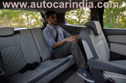 A decent amount of thir-row space, but floor is a bit high; note seatbelts for three people.