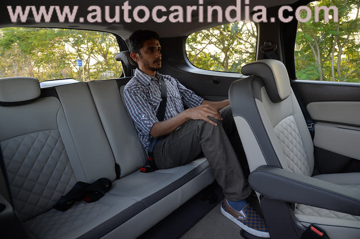 A decent amount of thir-row space, but floor is a bit high; note seatbelts for three people.