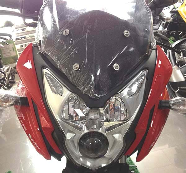 Transparent, tall visor up front will help deflect wind away from passengers.