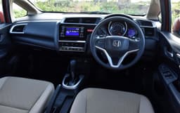 The dashboard design is similar to the City. Glossy inserts in the centre console look nice. The steering wheel too is the same as the sedan.