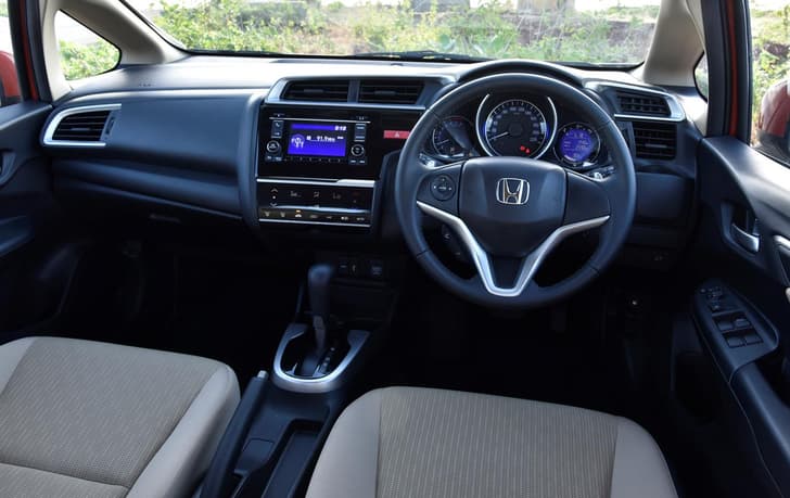 The dashboard design is similar to the City. Glossy inserts in the centre console look nice. The steering wheel too is the same as the sedan.