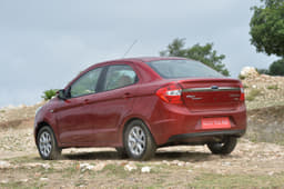 At the back, the Figo Aspire gets a pair of simple, single piece tail-lamps and black cladding on the bumper. Top-trim models get the addition of a thick band of chrome on the tailgate.