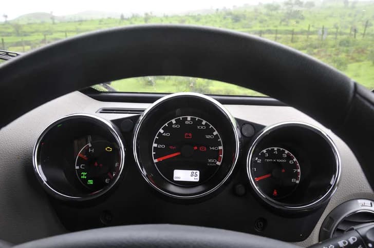 The instrument panel is new with a backlit odometer.