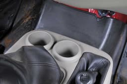 Two cupholders add a bit of practicality.